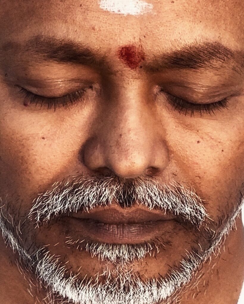 a man in meditation at vedic yoga academy