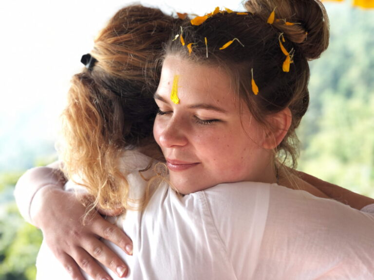 yoga therapy students hugging