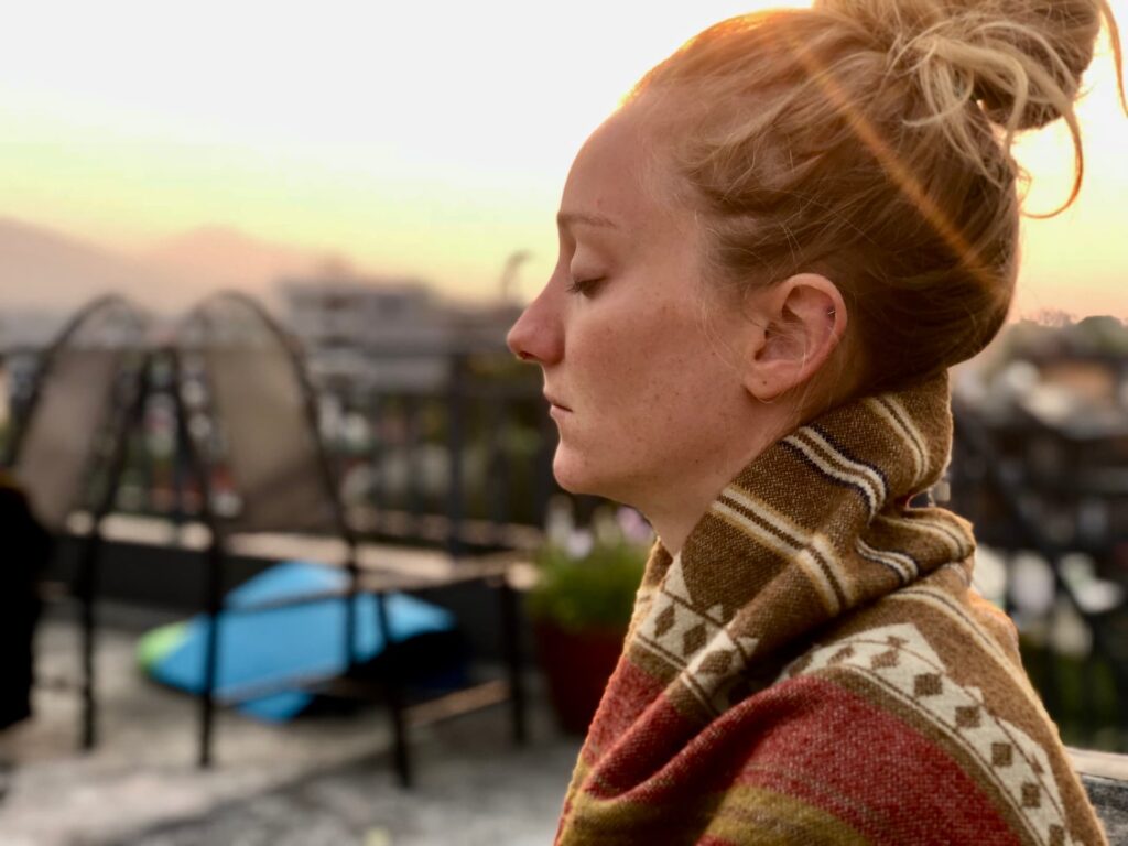 Student silent sitting morning class during advance meditation course