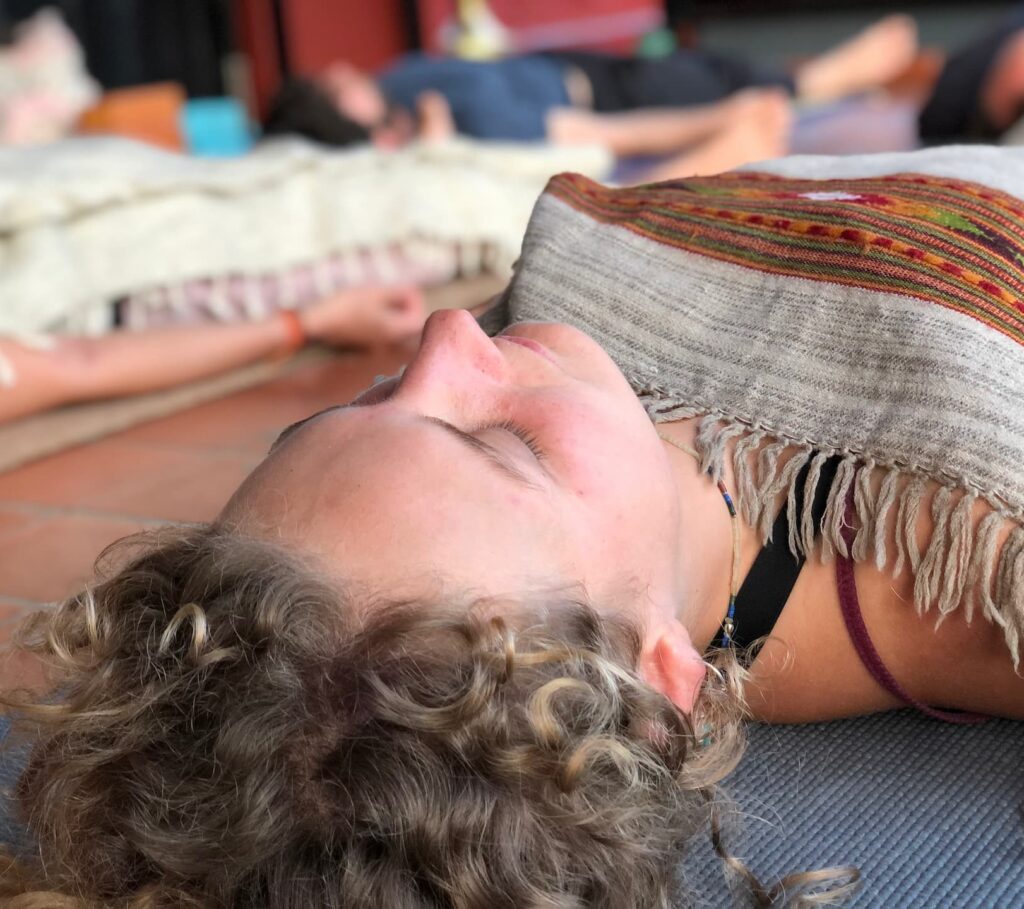 a woman learning step by step sleep practice