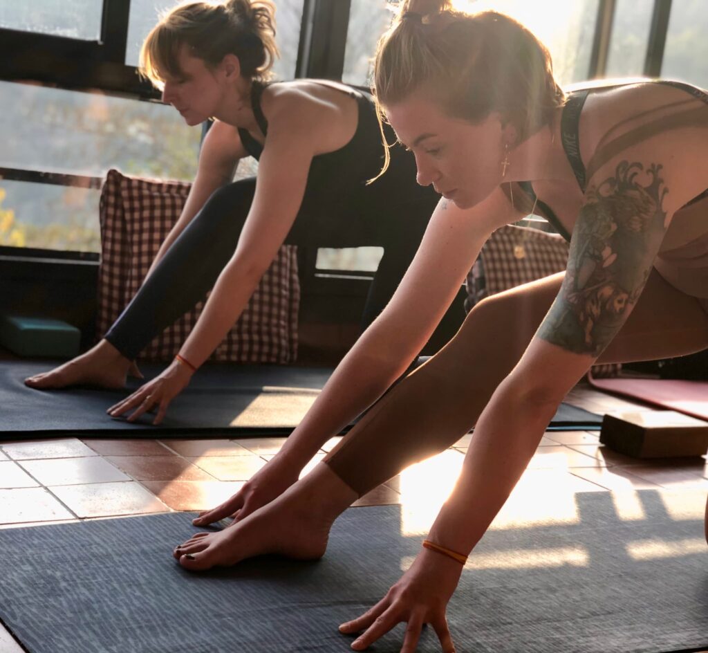 female students during advanced hatha yoga class